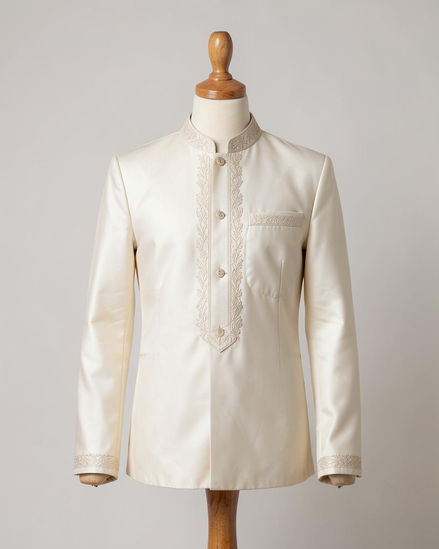 Ecru silk Nehru jacket with tonal embroidery on a headless tailor mannequin