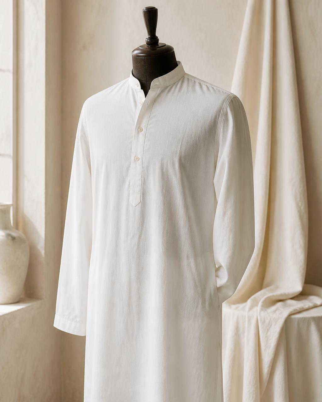 Made-to-measure ivory kurta on a headless tailor's mannequin